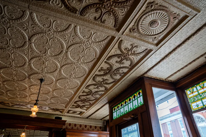 Detail of the ornate pressed-metal ceiling