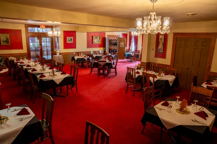 Formal dining room with red carpet