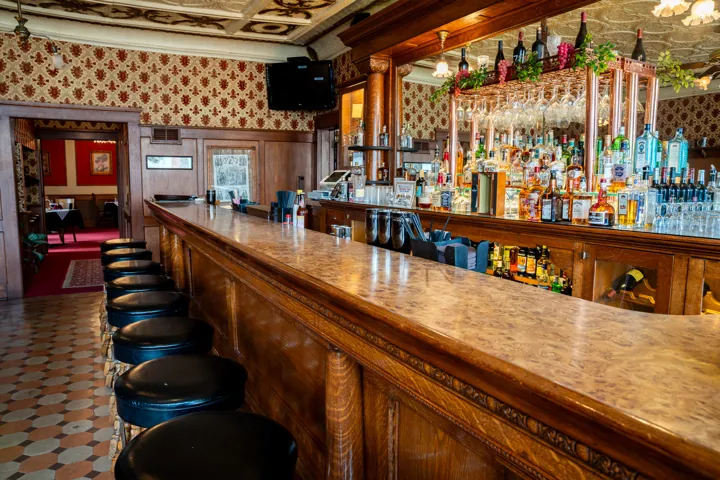 Long view along the historic wooden bar
