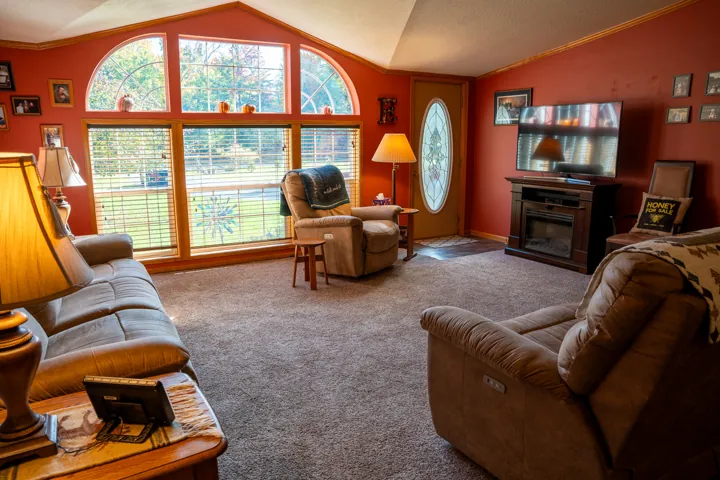 Bright living room with tall arched windows