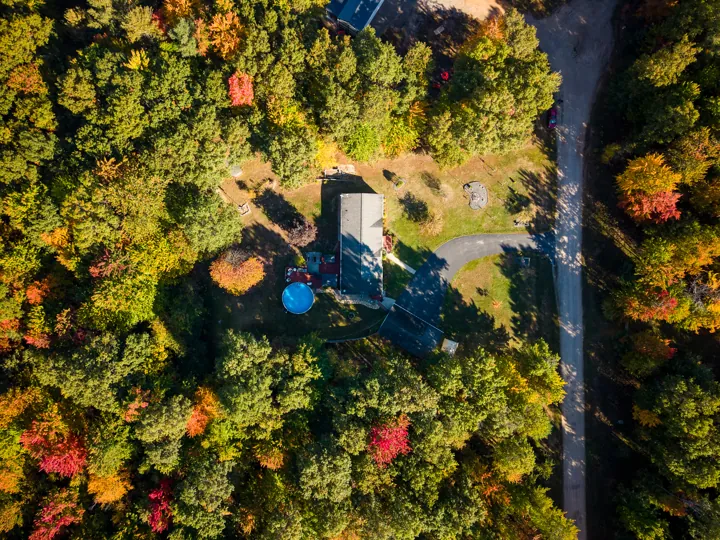 Overhead drone view of the home and grounds